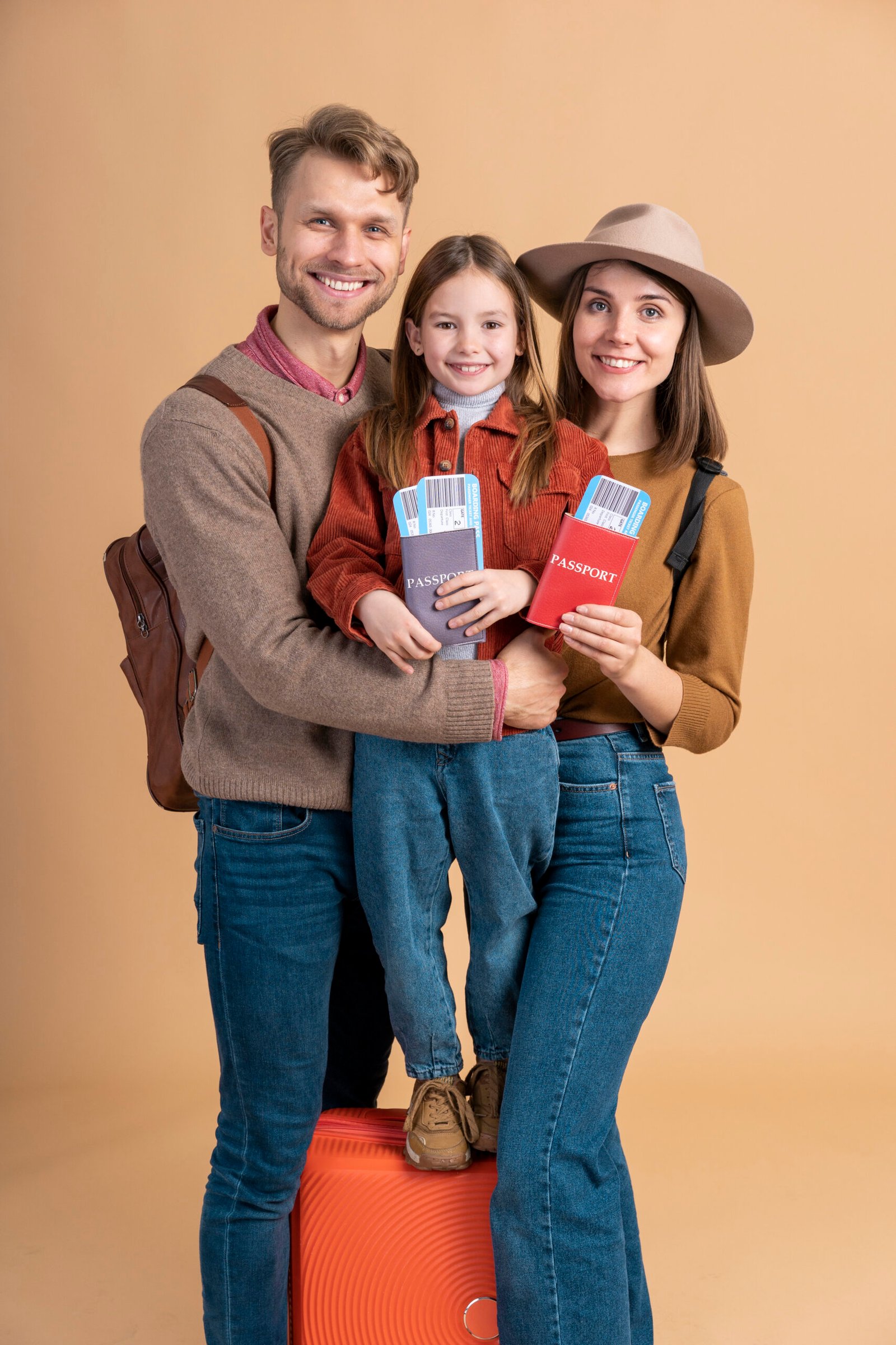 family-three-ready-traveling-with-passport-plane-tickets
